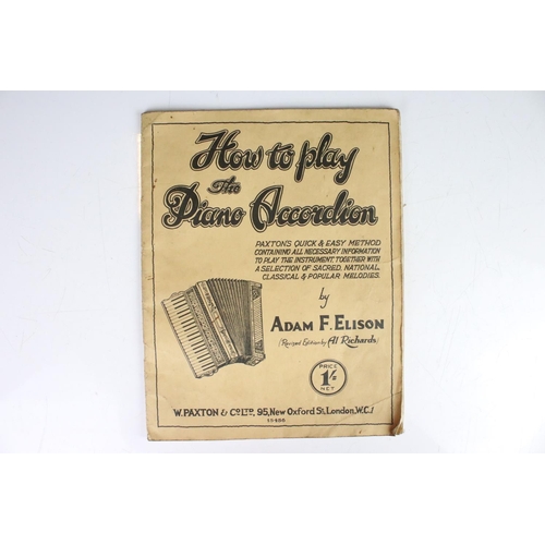 398 - A vintage Estrella piano accordion complete with instruction book and original case.