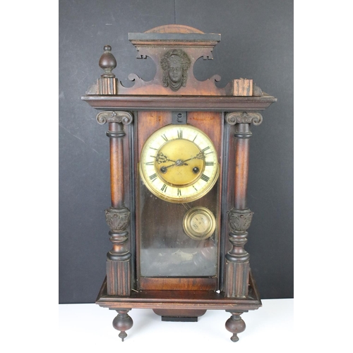 413 - A wooden wall clock together with a mantle clock and a wooden desk tidy.
