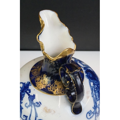 14 - Early 20th Century James Macintyre blue & white gilded jug, of squat baluster form, with floral deco... 