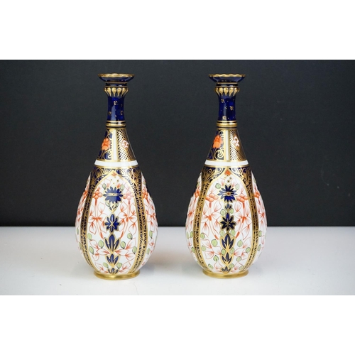 18 - Pair of early 20th Century Royal Crown Derby Imari pattern tapering vases, pattern 1128, approx 18.5... 