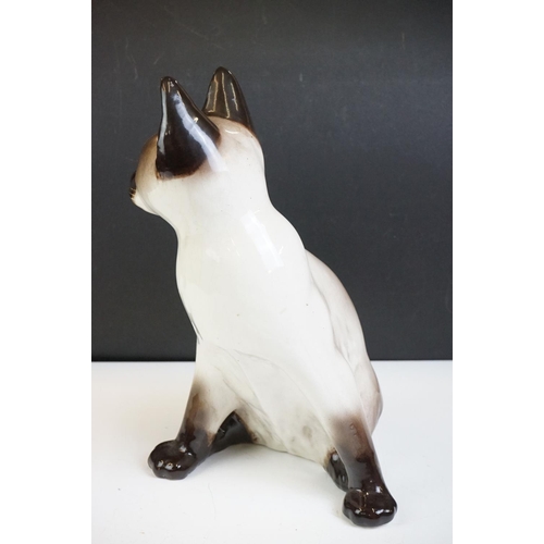 19 - Winstanley pottery model of a Seated Siamese Cat, with blue glass eyes, signed ' Kensington 32 Winst... 