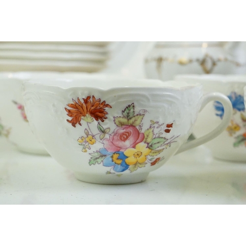 24 - 19th Century white ground & gilt tea set (teapot & cover, 7 teacups, 4 saucers, 5 tea plates, milk j... 