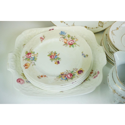 24 - 19th Century white ground & gilt tea set (teapot & cover, 7 teacups, 4 saucers, 5 tea plates, milk j... 