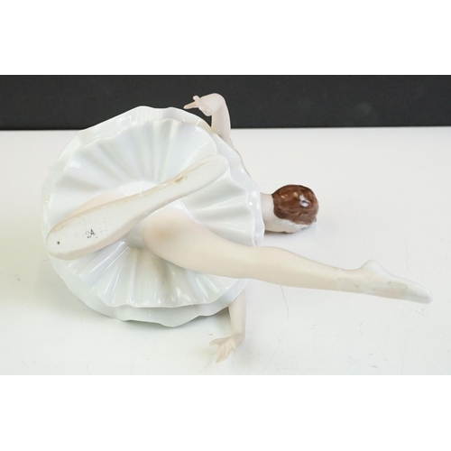 29 - Royal Dux figure of a kneeling ballerina, no. 22215, 19cm high (with Royal Dux paper label)