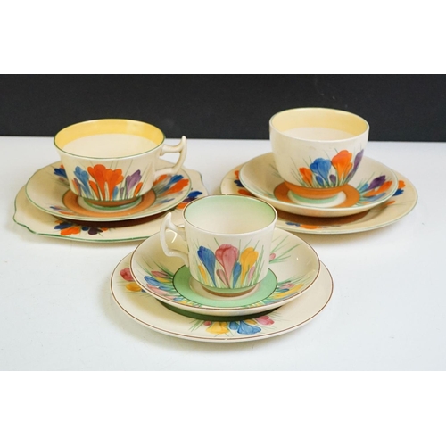 32 - Three Clarice Cliff 'Crocus' pattern trios to include a Wilkinson Pottery 'Bizarre' trio, Royal Staf... 