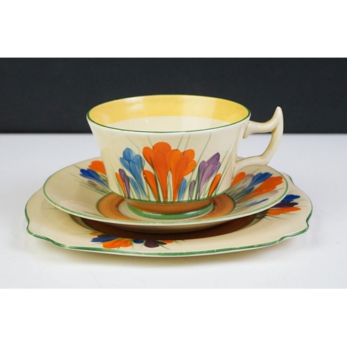 32 - Three Clarice Cliff 'Crocus' pattern trios to include a Wilkinson Pottery 'Bizarre' trio, Royal Staf... 