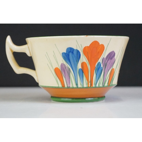 32 - Three Clarice Cliff 'Crocus' pattern trios to include a Wilkinson Pottery 'Bizarre' trio, Royal Staf... 