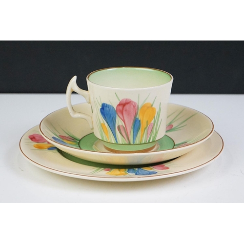 32 - Three Clarice Cliff 'Crocus' pattern trios to include a Wilkinson Pottery 'Bizarre' trio, Royal Staf... 