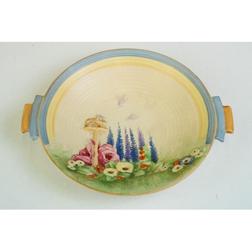 35 - Art Deco Royal Winton Dish with moulded decoration of a Birds and a Bird Table in a Garden, 23cm dia... 