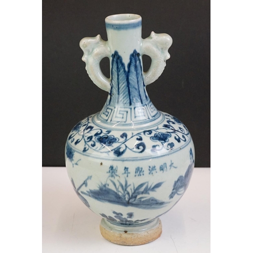 48 - Chinese blue & white twin-handled ceramic bottle vase decorated with warriors on horseback, with han... 