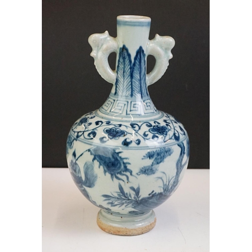 48 - Chinese blue & white twin-handled ceramic bottle vase decorated with warriors on horseback, with han... 