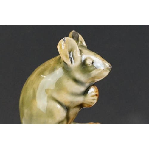 60 - Royal Doulton George Tinworth stoneware figure, modelled as a green glazed mouse grasping a currant,... 