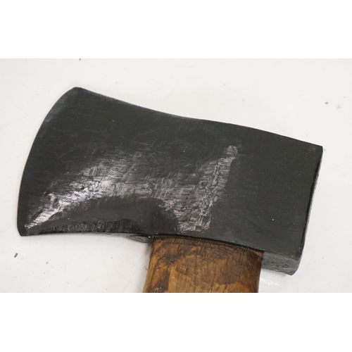 419 - An axe, 86cm long and another, 88cm long