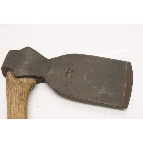 419 - An axe, 86cm long and another, 88cm long