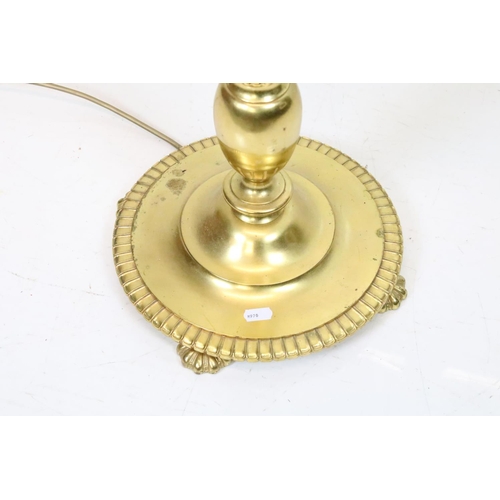 638 - 20th century Brass Corinthian Column Standard Lamp raised on a circular base with four feet, with sh... 