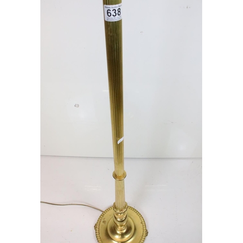 638 - 20th century Brass Corinthian Column Standard Lamp raised on a circular base with four feet, with sh... 