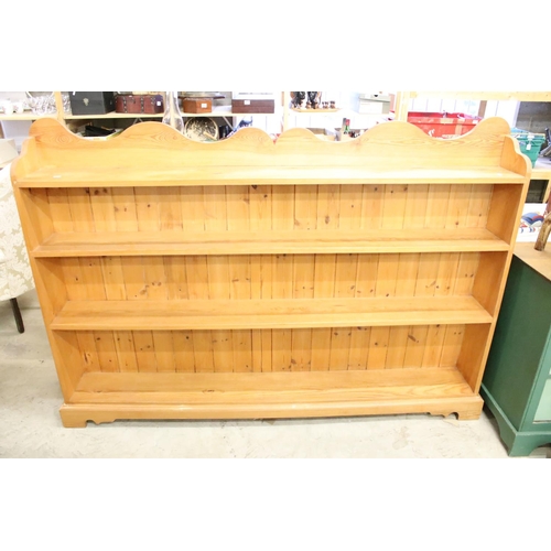 647 - Large 19th century style Pine Bookcase with shaped top rail and four shelves, 183cm long x 129cm hig... 