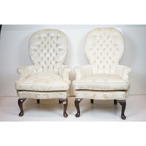 648 - Pair of Victorian style Button Back Armchairs upholstered in cream fabric, raised on front cabriole ... 