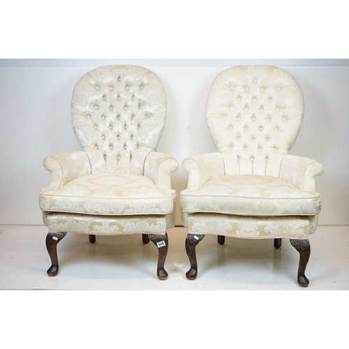 648 - Pair of Victorian style Button Back Armchairs upholstered in cream fabric, raised on front cabriole ... 