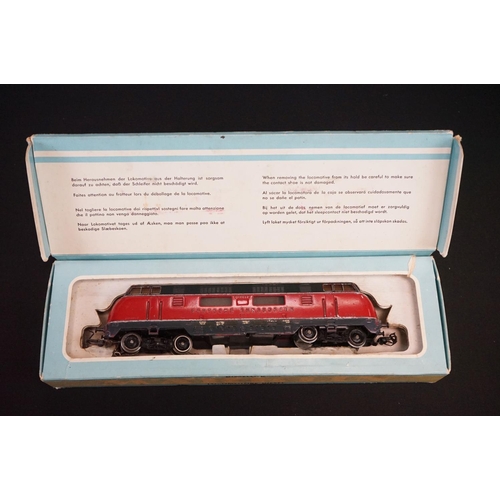 194 - Four boxed Marklin HO gauge locomotives to include 3021, 4062, 3003 & 3062, tatty boxes with tape re... 