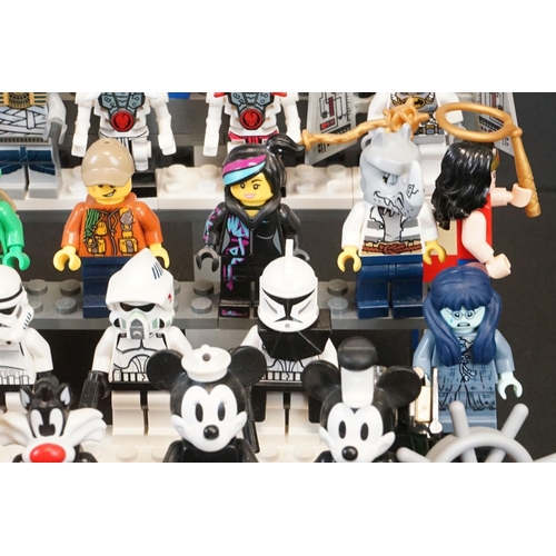 219 - Lego - 63 Lego Minifigures featuring Series Team GB, Lego Movie Series, Series 18, etc to include Mi... 