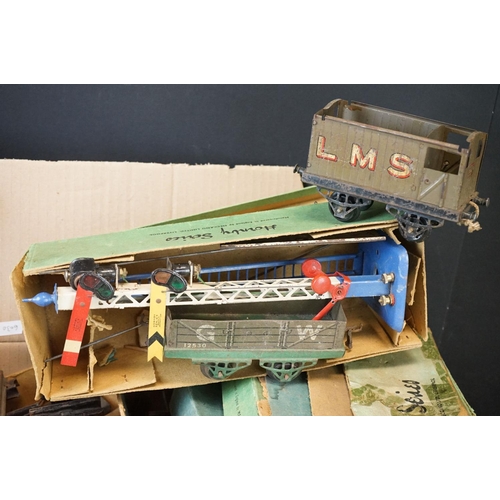 204 - Quantity of Hornby O gauge model railway to include 9 x items of rolling stock, various track and po... 