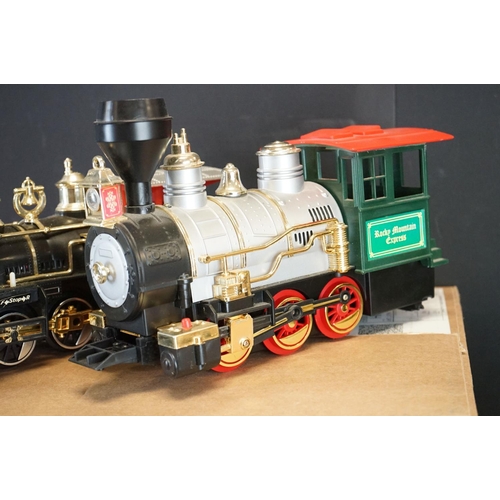 215 - Quantity of plastic battery powered model railway to include 2 x Rocky Mountain Express Locomotives,... 