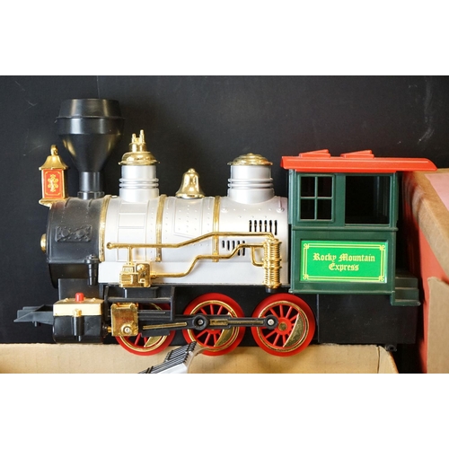 215 - Quantity of plastic battery powered model railway to include 2 x Rocky Mountain Express Locomotives,... 