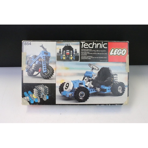 311 - Lego - Four boxed Lego Technics sets to include 854 Go-Kart, 8829 Dune Blaster, 8851 Excavator &  88... 