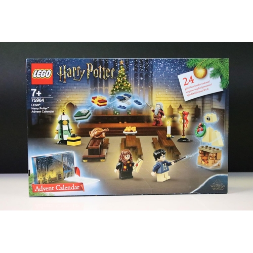 321 - Lego - Two boxed Harry Potter Wizarding World Advent Calendars to include 75964 & 76404, both sealed... 