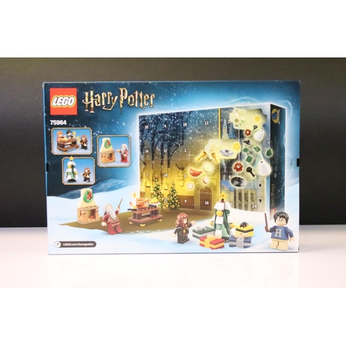 321 - Lego - Two boxed Harry Potter Wizarding World Advent Calendars to include 75964 & 76404, both sealed... 