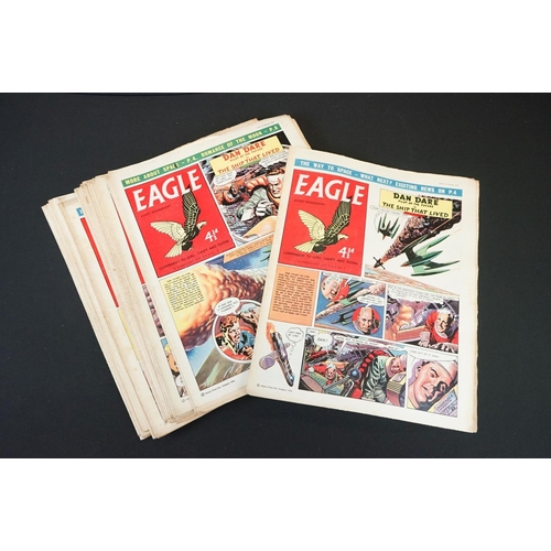 378 - Comics - Over 40 Eagle comics featuring Dan Dare, all from 1957 & 1958, mainly in a gd overall condi... 