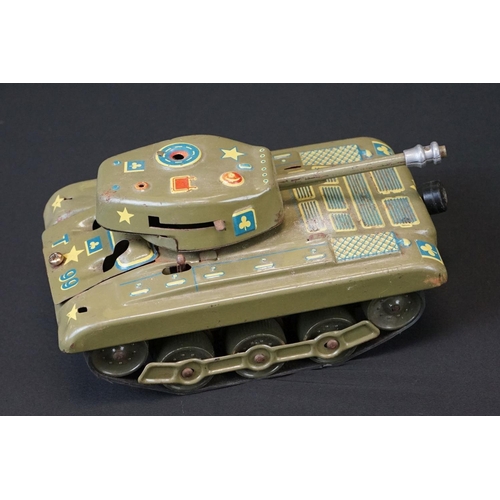 384 - Three play worn mid 20th C tin plate models to include Gama T99 Tank (missing a wheel), Western Germ... 