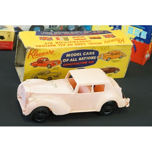 385 - 12 Boxed plastic and metal models to include Minister Deluxe in black, Friction Drive Rolls Royce Si... 