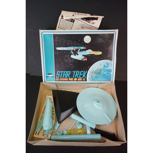 392 - Four boxed plastic model kits to include Aurora no. 921 Star Trek U.S.S. Enterprise (partly built), ... 