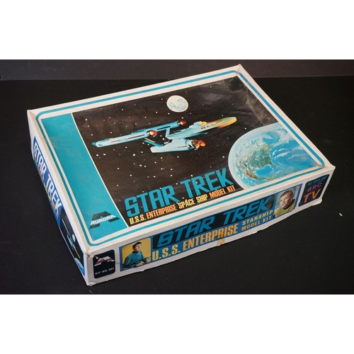 392 - Four boxed plastic model kits to include Aurora no. 921 Star Trek U.S.S. Enterprise (partly built), ... 