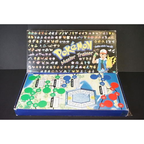 394 - Pokémon Trading Cards - Boxed MB Pokemon Master Trainer board game along with Pokemon collectibles t... 