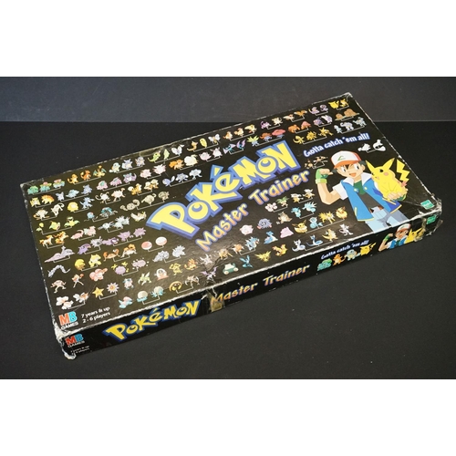 394 - Pokémon Trading Cards - Boxed MB Pokemon Master Trainer board game along with Pokemon collectibles t... 