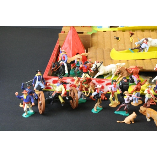 375 - Around 40 plastic figures, mainly Timpo Toys Wild West examples, featuring canoes, cowboys & mounted... 