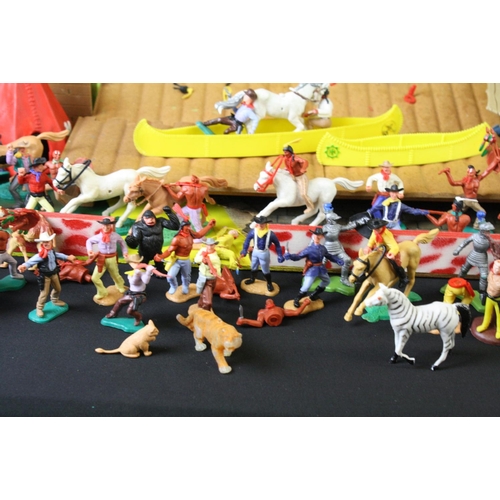 375 - Around 40 plastic figures, mainly Timpo Toys Wild West examples, featuring canoes, cowboys & mounted... 