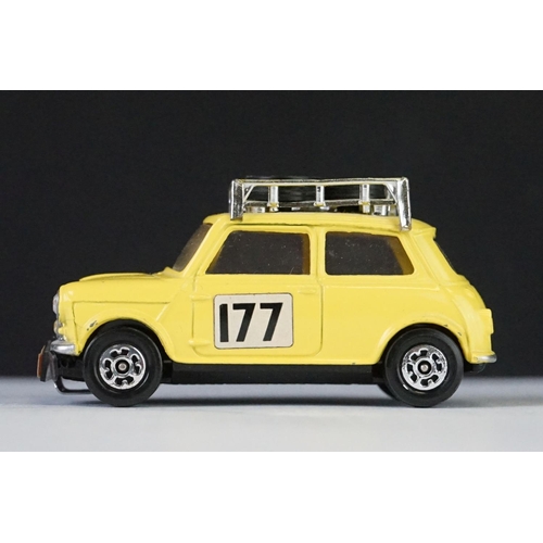 Three boxed Corgi diecast Mini models to include 2 x
