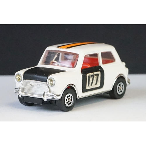 Three boxed Corgi diecast Mini models to include 2 x