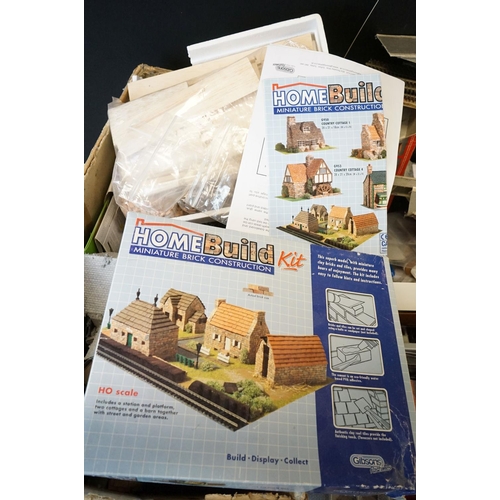 129 - Very large collection of OO gauge trackside accessories mainly including built card buildings, scene... 