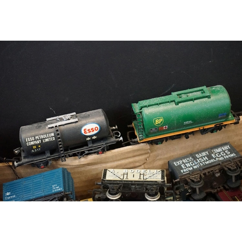 151 - Around 50 OO gauge items of rolling stock to include Mainline, Dapol, kit built, Hornby etc featurin... 