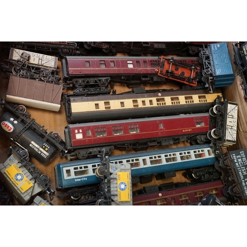 151 - Around 50 OO gauge items of rolling stock to include Mainline, Dapol, kit built, Hornby etc featurin... 