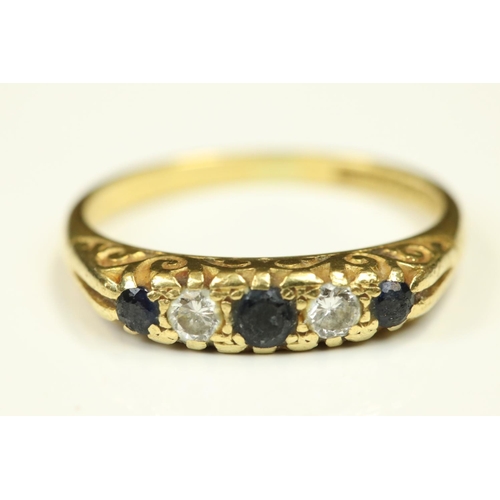 103 - Sapphire and diamond 18ct yellow gold five stone ring, small round mixed cut stones, claw set, scrol... 