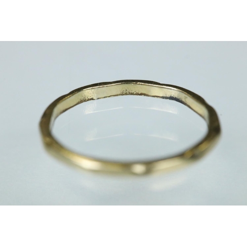 111 - Orange topaz white metal ring, the round mixed cut topaz diameter approx 8mm, claw set, tapered shou... 