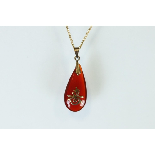 112 - Cameo 9ct yellow gold ring, size O; a 9ct gold Star of David pendant; a 9ct gold heart shaped pendan... 