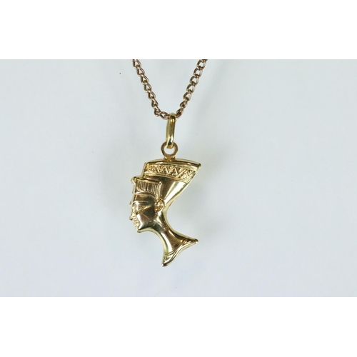 113 - Yellow metal Nefertiti pendant, indistinct hallmarks, together with a 9ct rose metal chain, length a... 