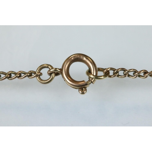 113 - Yellow metal Nefertiti pendant, indistinct hallmarks, together with a 9ct rose metal chain, length a... 
